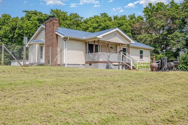 6857 Pulltight Hill Rd, College Grove, TN 37046 - view of front of property featuring a porch, a metal roof, a front yard, and a chimney