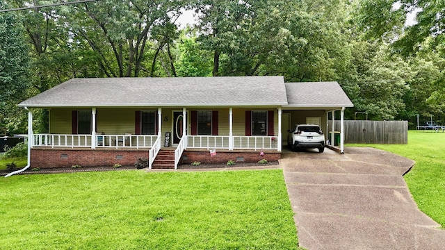 3090 Algee Ln, Milan, TN 38358 - view of front of house with covered porch, driveway, a carport, crawl space, and a shingled roof