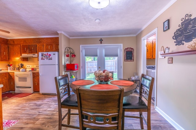 3090 Algee Ln, Milan, TN 38358 - dining area featuring wood finished floors, a textured ceiling, crown molding, and french doors