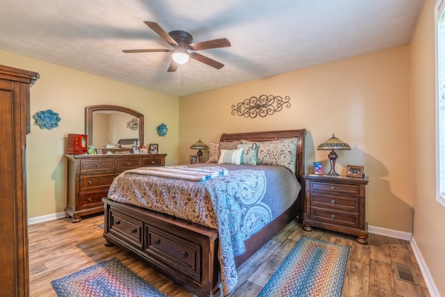 3090 Algee Ln, Milan, TN 38358 - bedroom with wood finished floors and a ceiling fan