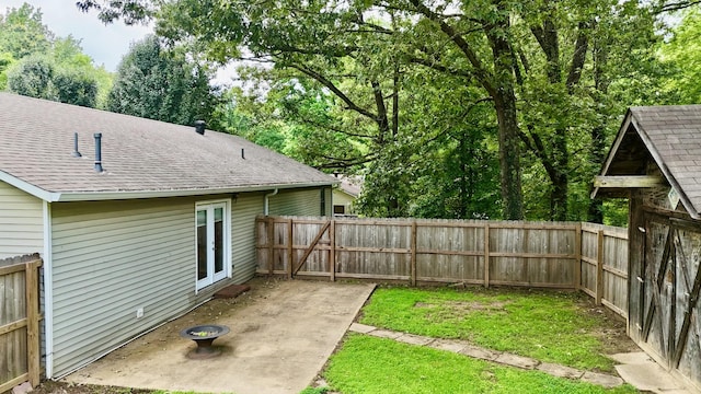3090 Algee Ln, Milan, TN 38358 - fenced backyard with a patio area