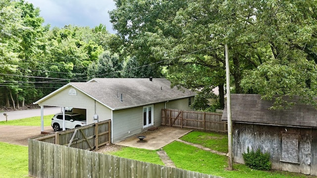 3090 Algee Ln, Milan, TN 38358 - rear view of house featuring a shingled roof