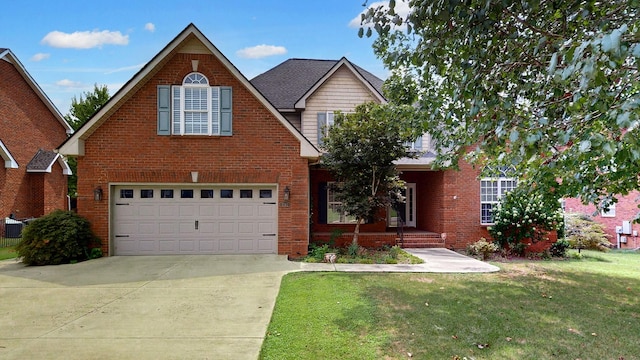 5142 Reagan Dr, Murfreesboro, TN 37129 - traditional-style house with an attached garage, brick siding, concrete driveway, and a front yard