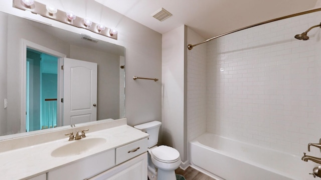 5142 Reagan Dr, Murfreesboro, TN 37129 - bathroom featuring vanity, bathing tub / shower combination, and wood finished floors