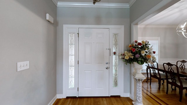 5142 Reagan Dr, Murfreesboro, TN 37129 - entrance foyer with ornamental molding, wood finished floors, and a chandelier