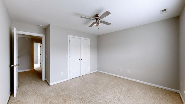 5142 Reagan Dr, Murfreesboro, TN 37129 - unfurnished bedroom featuring light carpet, a closet, and a ceiling fan