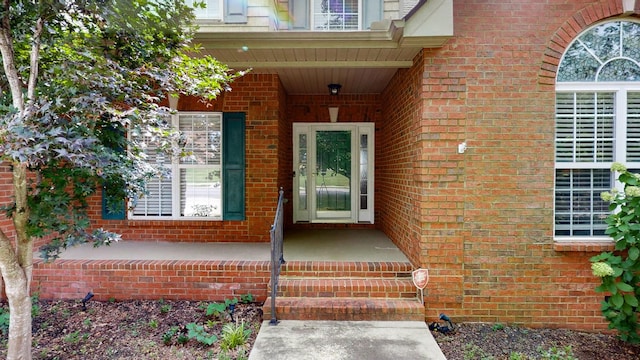 5142 Reagan Dr, Murfreesboro, TN 37129 - view of exterior entry featuring brick siding and a porch