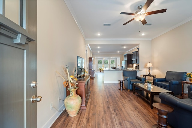 2129 Halfmoon Way, Murfreesboro, TN 37130 - living area featuring a ceiling fan, dark wood finished floors, ornamental molding, and recessed lighting