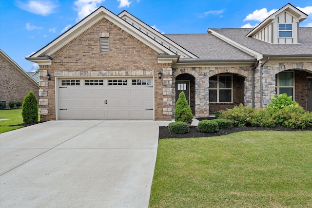 2129 Halfmoon Way, Murfreesboro, TN 37130 - view of front of property with a shingled roof, a front yard, concrete driveway, and an attached garage