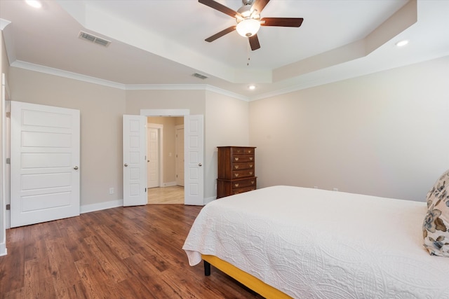 2129 Halfmoon Way, Murfreesboro, TN 37130 - bedroom featuring a tray ceiling, recessed lighting, wood finished floors, ornamental molding, and a ceiling fan