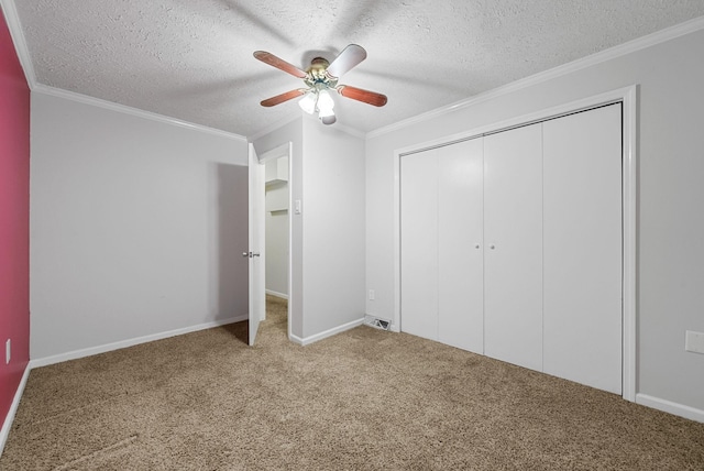 1731 Broadripple Dr, Clarksville, TN 37042 - unfurnished bedroom featuring carpet floors, a textured ceiling, crown molding, a closet, and a ceiling fan