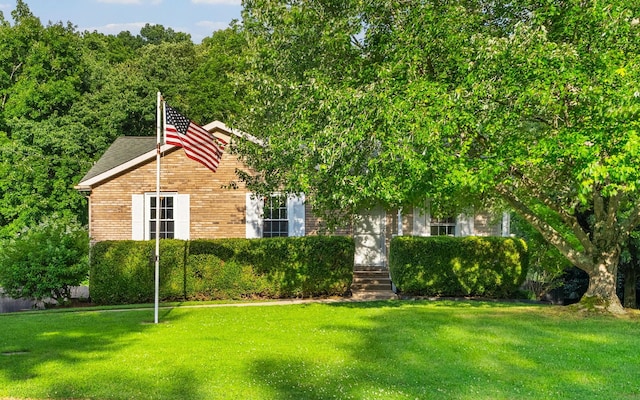1731 Broadripple Dr, Clarksville, TN 37042 - view of front of property with a front yard and brick siding