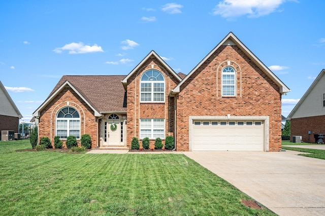 5241 Ticonderoga Ave, Murfreesboro, TN 37129 - traditional home featuring brick siding, a garage, driveway, and a front lawn
