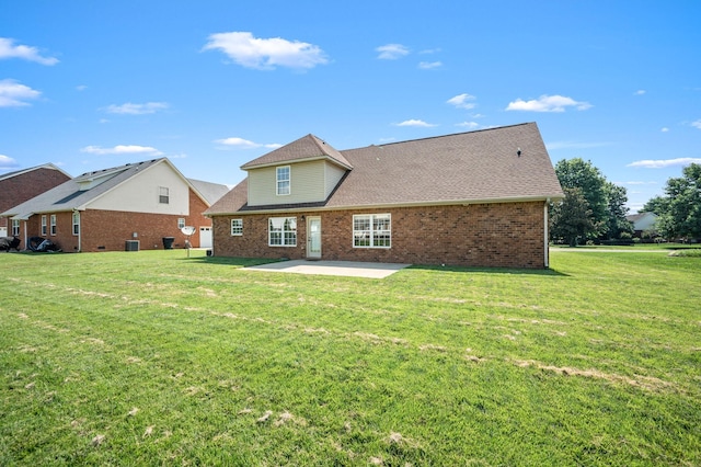 5241 Ticonderoga Ave, Murfreesboro, TN 37129 - rear view of property featuring a patio, a lawn, and brick siding