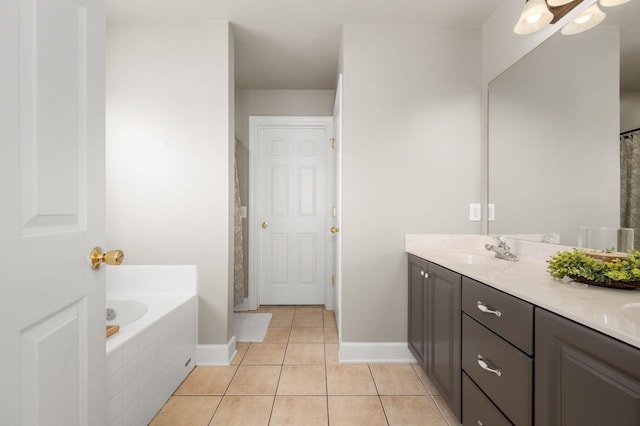 5241 Ticonderoga Ave, Murfreesboro, TN 37129 - bathroom with double vanity, a garden tub, and tile patterned flooring
