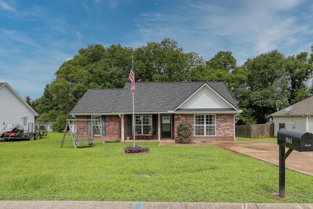 1944 Fieldstone Dr, Columbia, TN 38401 - ranch-style house featuring brick siding, a shingled roof, and covered porch