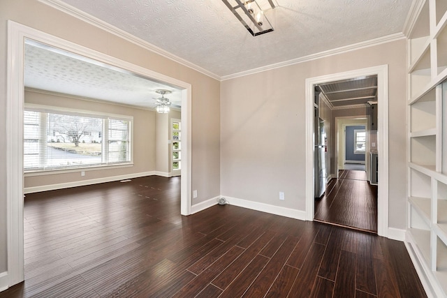 805 N Chancery St, Mcminnville, TN 37110 - empty room with wood finished floors, a textured ceiling, crown molding, and built in shelves
