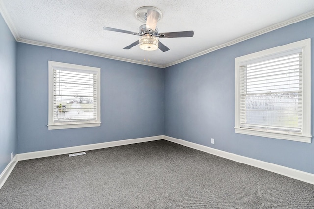 805 N Chancery St, Mcminnville, TN 37110 - unfurnished room with crown molding, dark colored carpet, a ceiling fan, and a textured ceiling