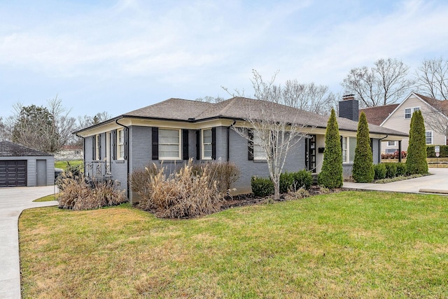 805 N Chancery St, Mcminnville, TN 37110 - single story home with a chimney, brick siding, an outbuilding, a front yard, and a detached garage