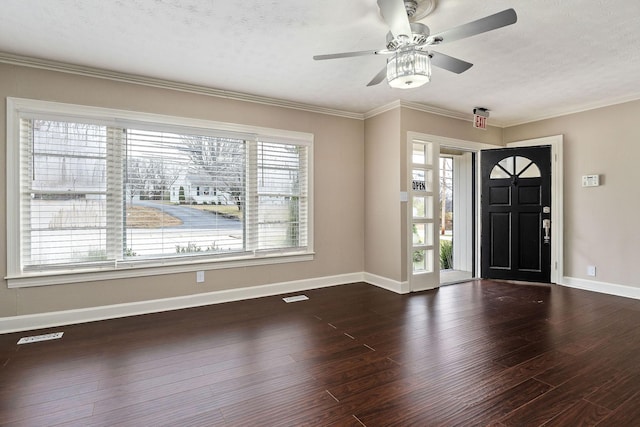 805 N Chancery St, Mcminnville, TN 37110 - foyer entrance with hardwood / wood-style floors, a textured ceiling, a ceiling fan, and crown molding