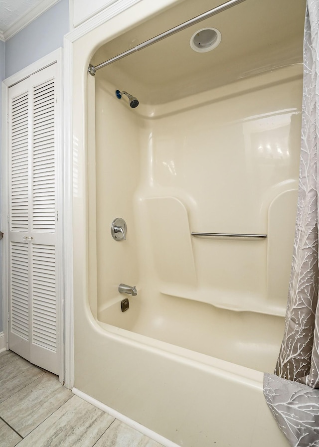 805 N Chancery St, Mcminnville, TN 37110 - full bathroom featuring shower / bath combination with curtain, crown molding, wood finished floors, and a closet
