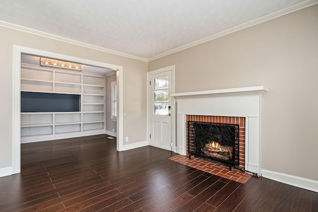 805 N Chancery St, Mcminnville, TN 37110 - unfurnished living room with wood finished floors, a fireplace, built in shelves, ornamental molding, and a textured ceiling