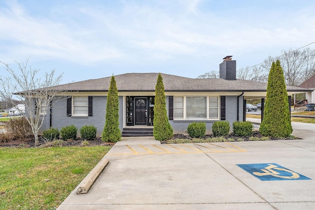 805 N Chancery St, Mcminnville, TN 37110 - ranch-style home with brick siding, a chimney, uncovered parking, and a shingled roof