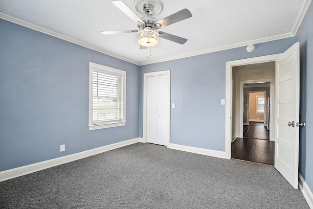 805 N Chancery St, Mcminnville, TN 37110 - unfurnished bedroom featuring multiple windows, crown molding, dark carpet, a closet, and ceiling fan