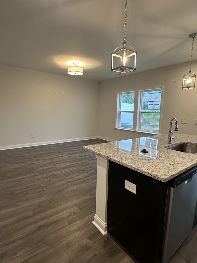 2127 Cheltenham Pl, Columbia, TN 38401 - kitchen featuring dark wood finished floors, dishwasher, pendant lighting, light stone counters, and open floor plan