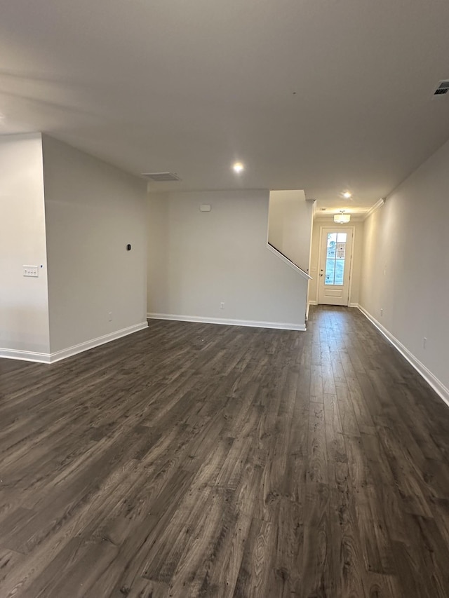 2127 Cheltenham Pl, Columbia, TN 38401 - unfurnished living room featuring dark wood-type flooring and recessed lighting
