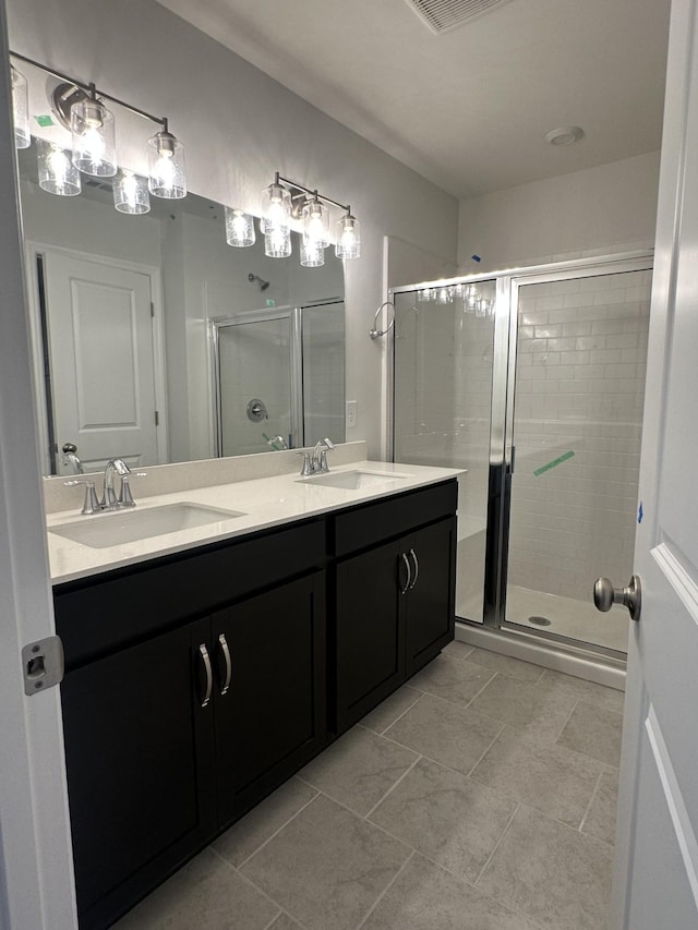 2127 Cheltenham Pl, Columbia, TN 38401 - full bath with a stall shower, double vanity, and tile patterned floors