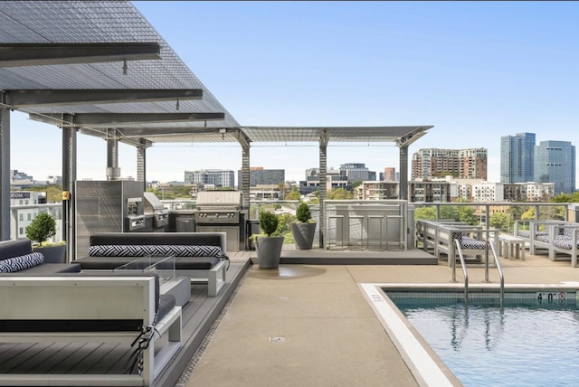 700 12th Ave S Unit 507, Nashville, TN 37203 - community pool with a city view and an outdoor living space