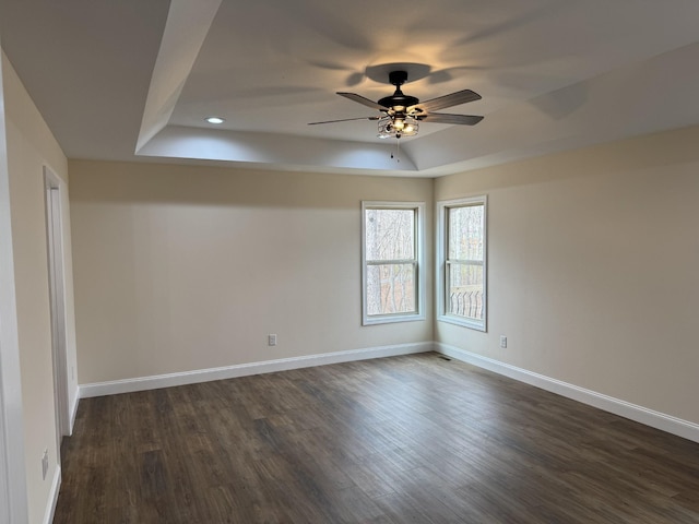 334 Cumberland Cove Rd Unit 5, Monterey, TN 38574 - empty room with a tray ceiling, dark wood-type flooring, a ceiling fan, and recessed lighting