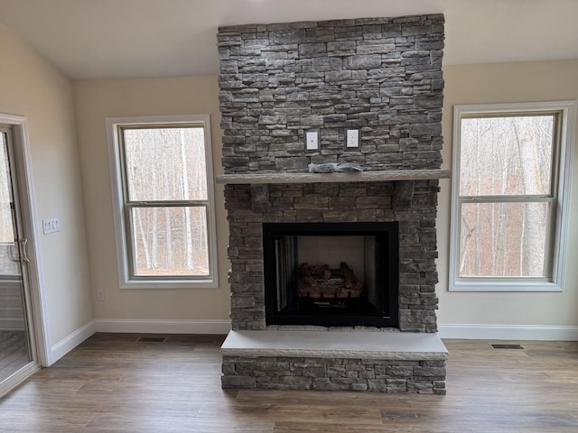 334 Cumberland Cove Rd Unit 5, Monterey, TN 38574 - detailed view of wood finished floors and a stone fireplace