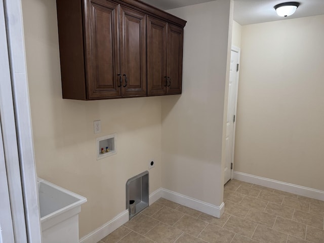 334 Cumberland Cove Rd Unit 5, Monterey, TN 38574 - laundry area featuring cabinet space, hookup for a washing machine, electric dryer hookup, and light tile patterned floors