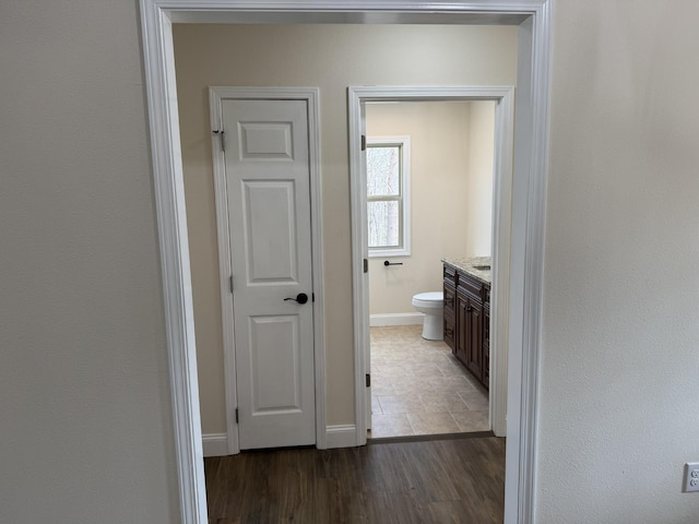 334 Cumberland Cove Rd Unit 5, Monterey, TN 38574 - hallway featuring baseboards and dark wood-type flooring