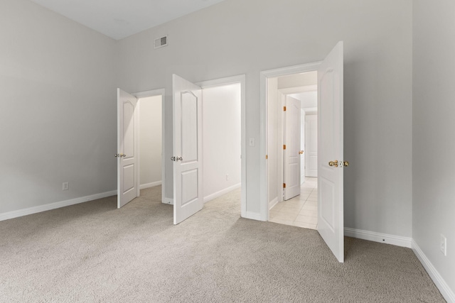 630 Black Horse Pkwy, Franklin, TN 37069 - unfurnished bedroom featuring light carpet and baseboards