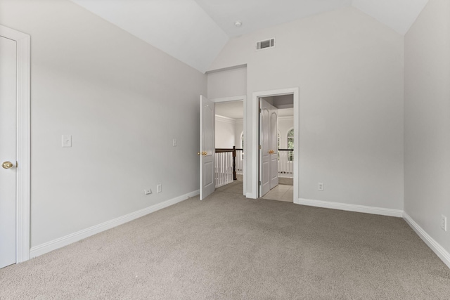 630 Black Horse Pkwy, Franklin, TN 37069 - unfurnished bedroom featuring carpet flooring, high vaulted ceiling, and connected bathroom