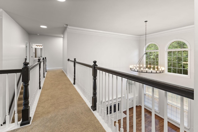 630 Black Horse Pkwy, Franklin, TN 37069 - hallway featuring a chandelier, an upstairs landing, crown molding, and recessed lighting