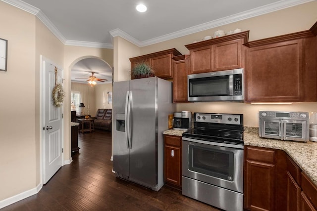 3116 Mapleside Ln, Murfreesboro, TN 37128 - kitchen with appliances with stainless steel finishes, light stone counters, ornamental molding, dark wood-style flooring, and a ceiling fan