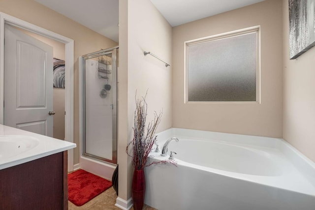 3116 Mapleside Ln, Murfreesboro, TN 37128 - bathroom featuring a garden tub, a shower stall, and vanity