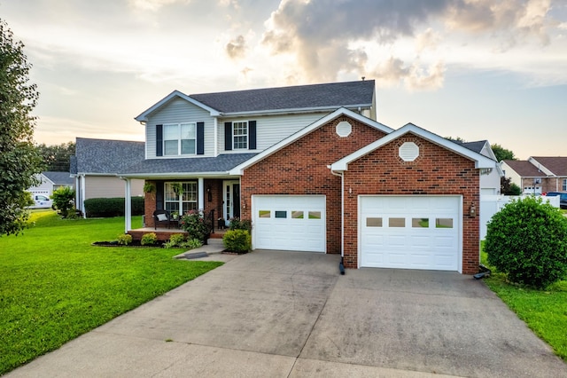 280 Ballygar Ct, Clarksville, TN 37043 - traditional home with a porch, driveway, an attached garage, brick siding, and a front yard