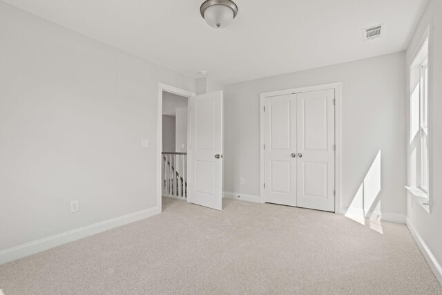 7507 Old Nashville Rd S, Fairview, TN 37062 - unfurnished bedroom with light colored carpet and a closet