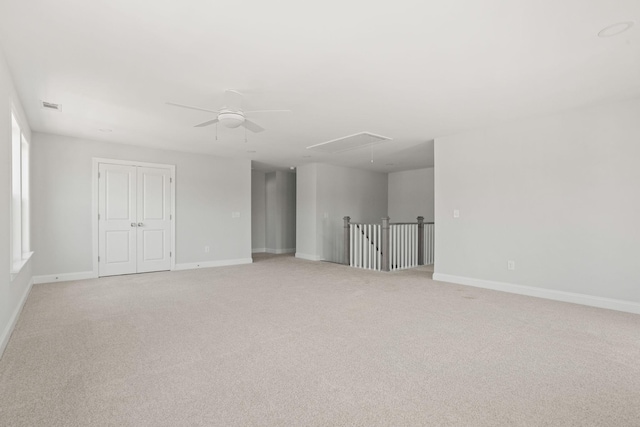 7507 Old Nashville Rd S, Fairview, TN 37062 - unfurnished room with attic access, a ceiling fan, and light colored carpet