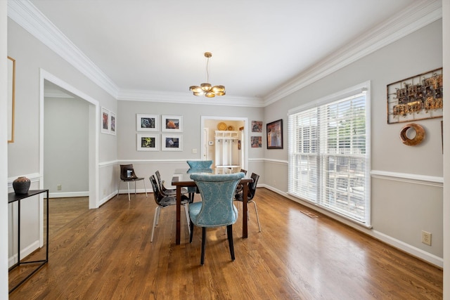 1470 Tyne Blvd, Nashville, TN 37215 - dining room featuring a chandelier, crown molding, and wood finished floors