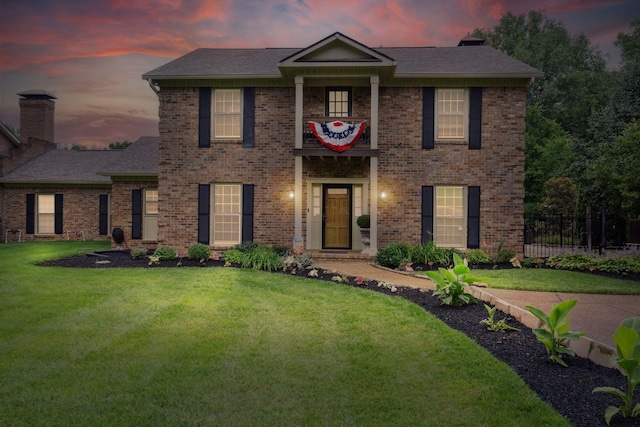 1470 Tyne Blvd, Nashville, TN 37215 - view of front of home featuring brick siding, a chimney, and a shingled roof