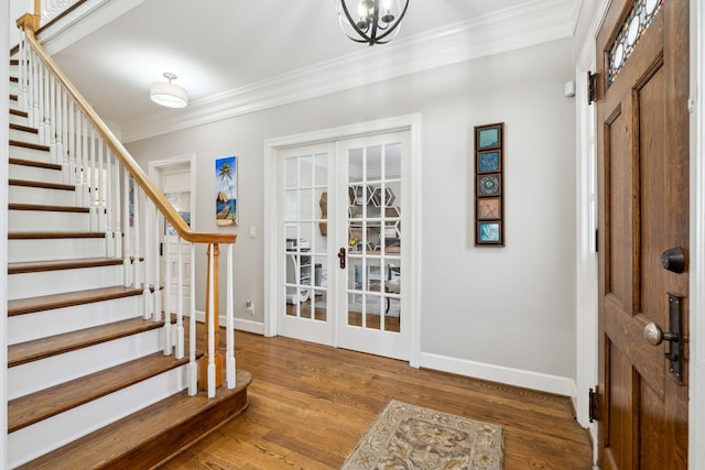 1470 Tyne Blvd, Nashville, TN 37215 - foyer featuring crown molding, french doors, stairs, and wood finished floors