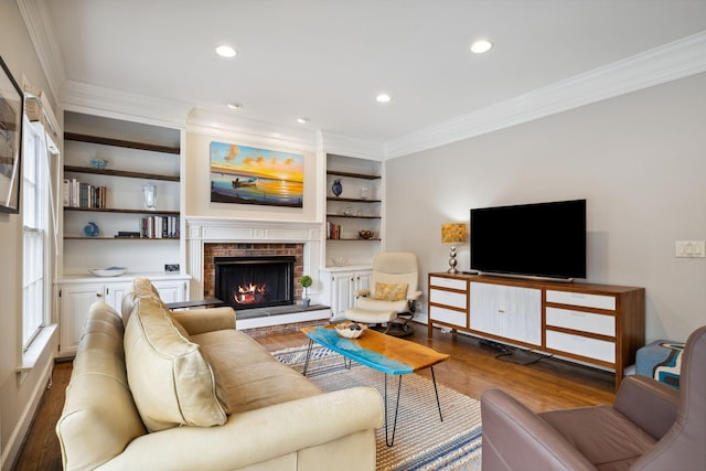 1470 Tyne Blvd, Nashville, TN 37215 - living room featuring crown molding, wood finished floors, a fireplace, recessed lighting, and built in features