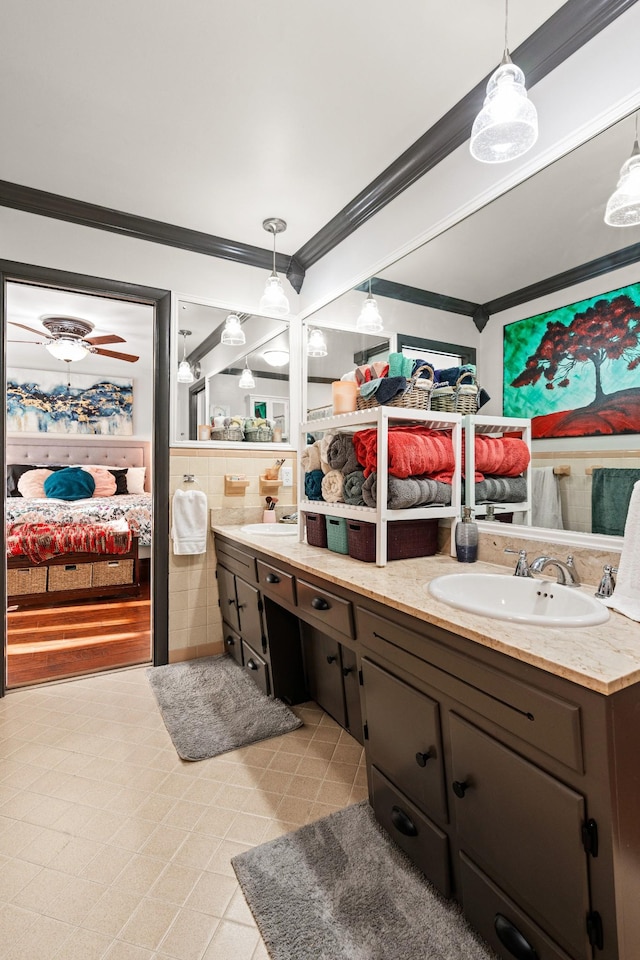 605 Jackson Ave, Carthage, TN 37030 - ensuite bathroom featuring crown molding, double vanity, and a ceiling fan