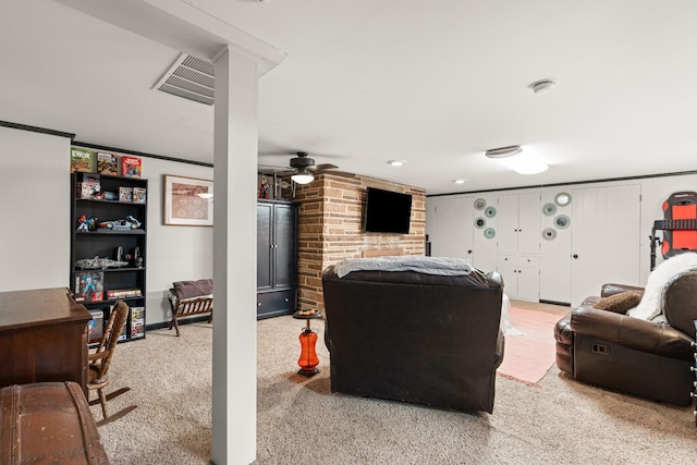 605 Jackson Ave, Carthage, TN 37030 - living room featuring light carpet, ceiling fan, and crown molding